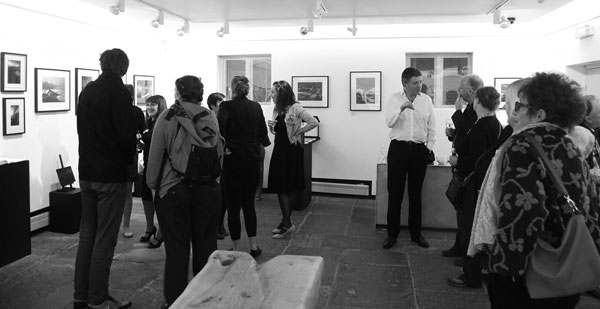 Visitors at Chris Knox' exhibition at the Hop Gallery